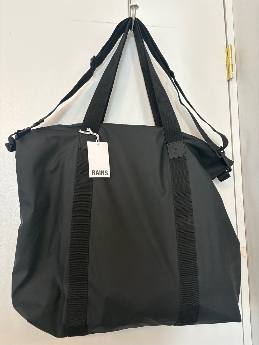 Rains Waterproof Black Tote Duffel Bag with Adjustable Shoulder Strap